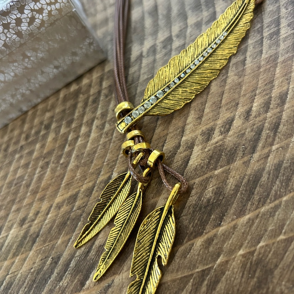Gold Feather Pendant Necklace